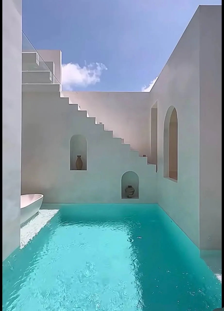 White Courtyard Pool & Arched Minimalist Shell, International